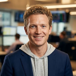 Ryan Brooks, Analista Principal de Trading na Vasto Madurência, em imagem de perfil